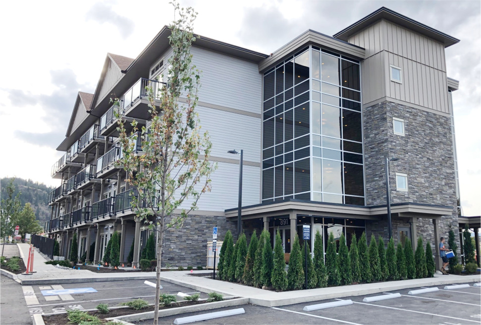 Apartment building entrance and parking