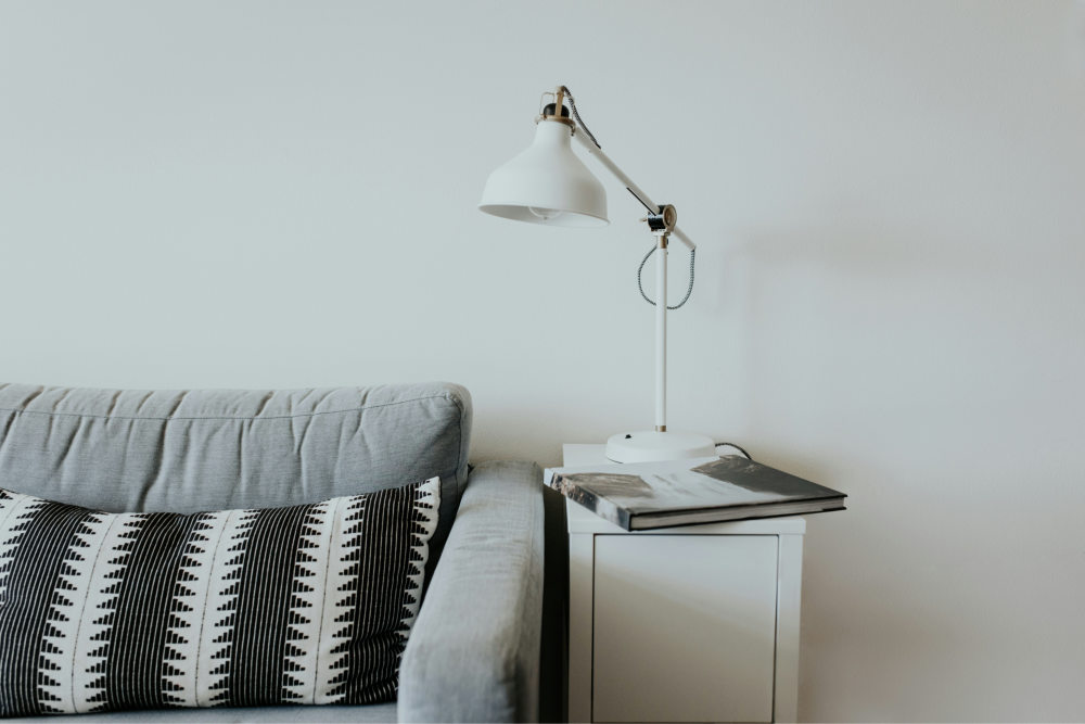 Photos of a small sofa and side table
